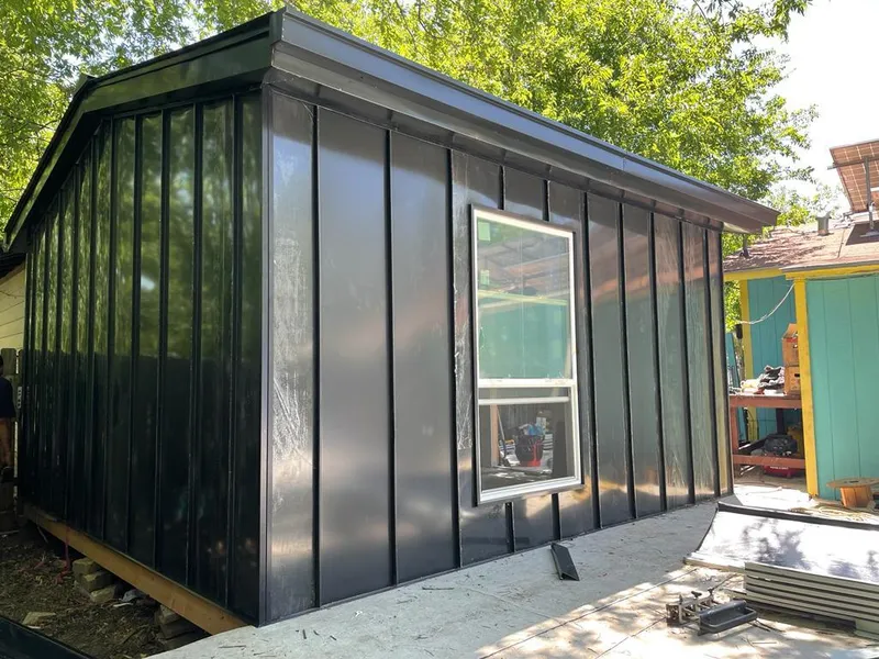 Black standing seam metal wall panels for Metal Roof Installation in South Berwick