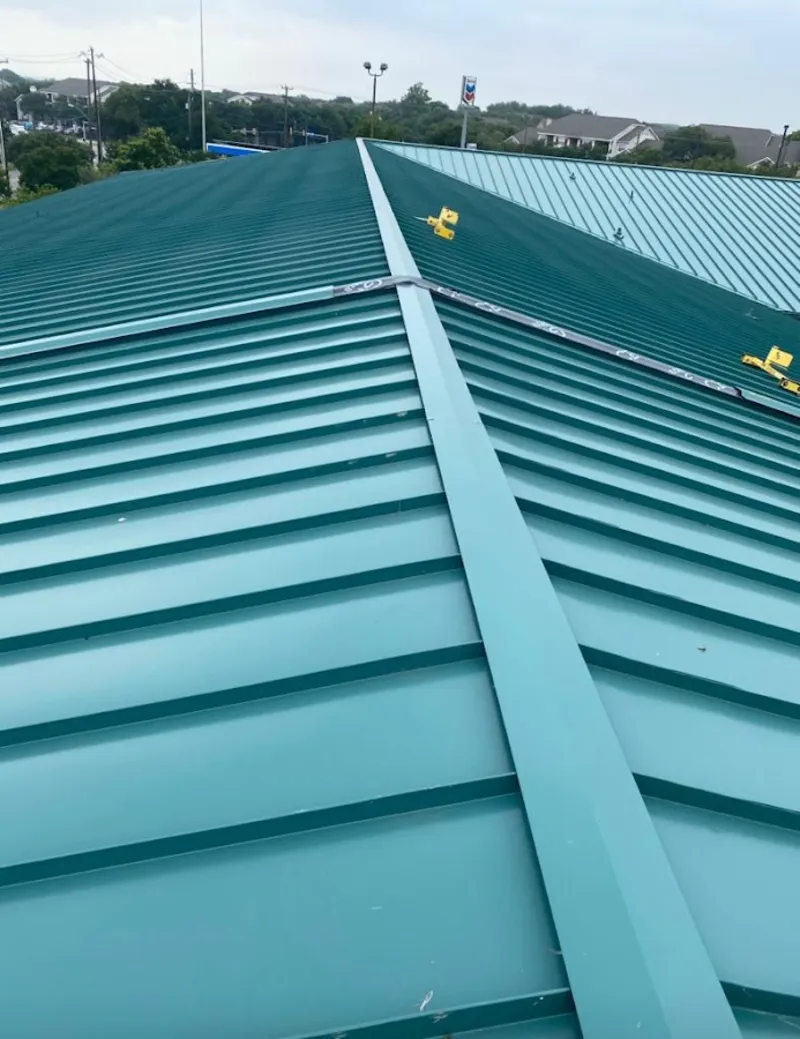 Green commercial metal roof ridge and valley for Metal Roof Repair in South Berwick